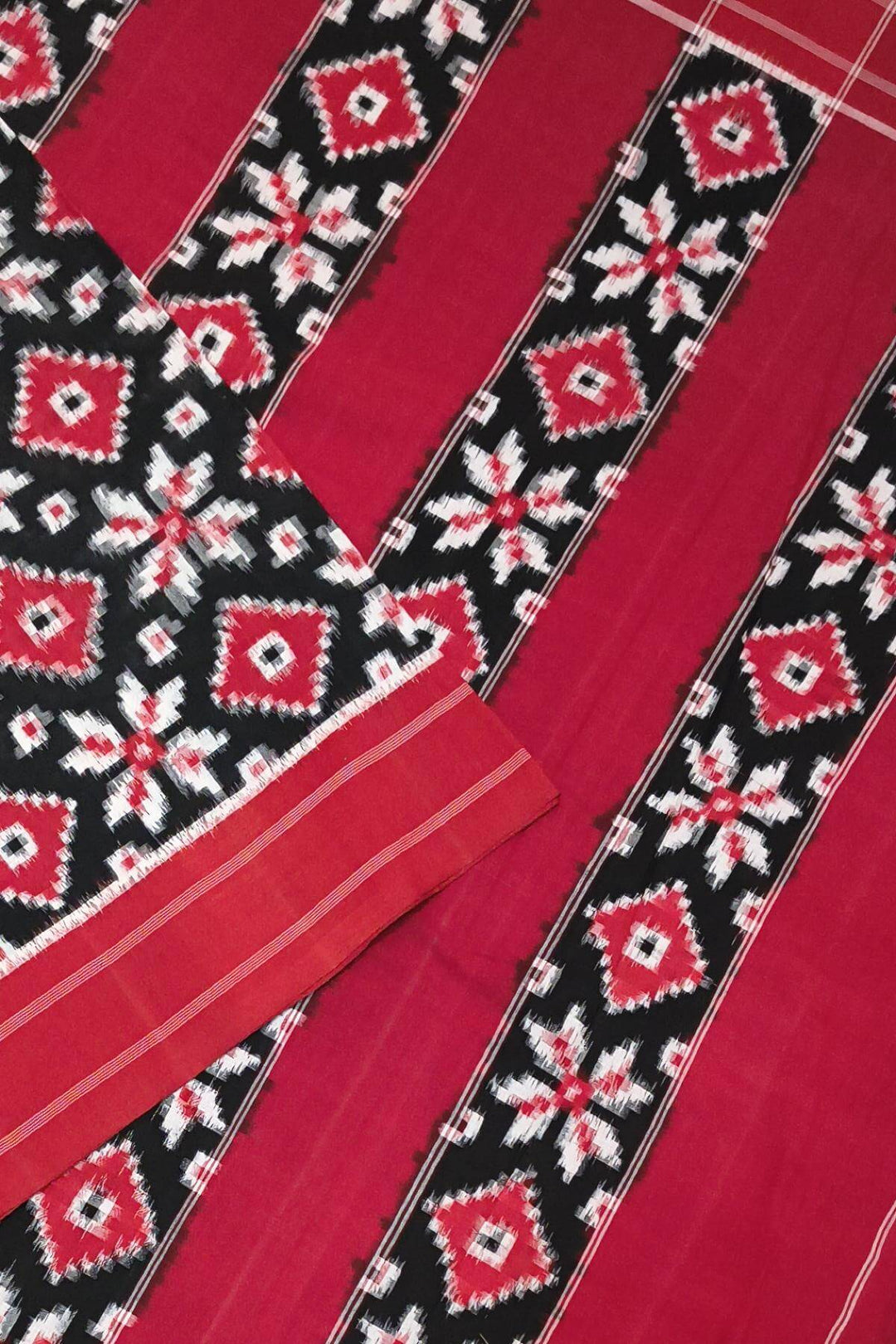Handwoven double ikkat telia  pure cotton saree in black