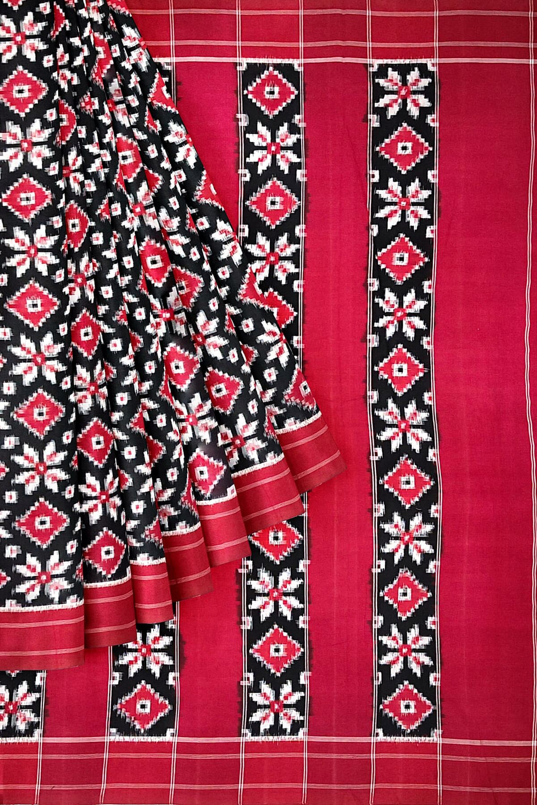 Handwoven double ikkat telia  pure cotton saree in black