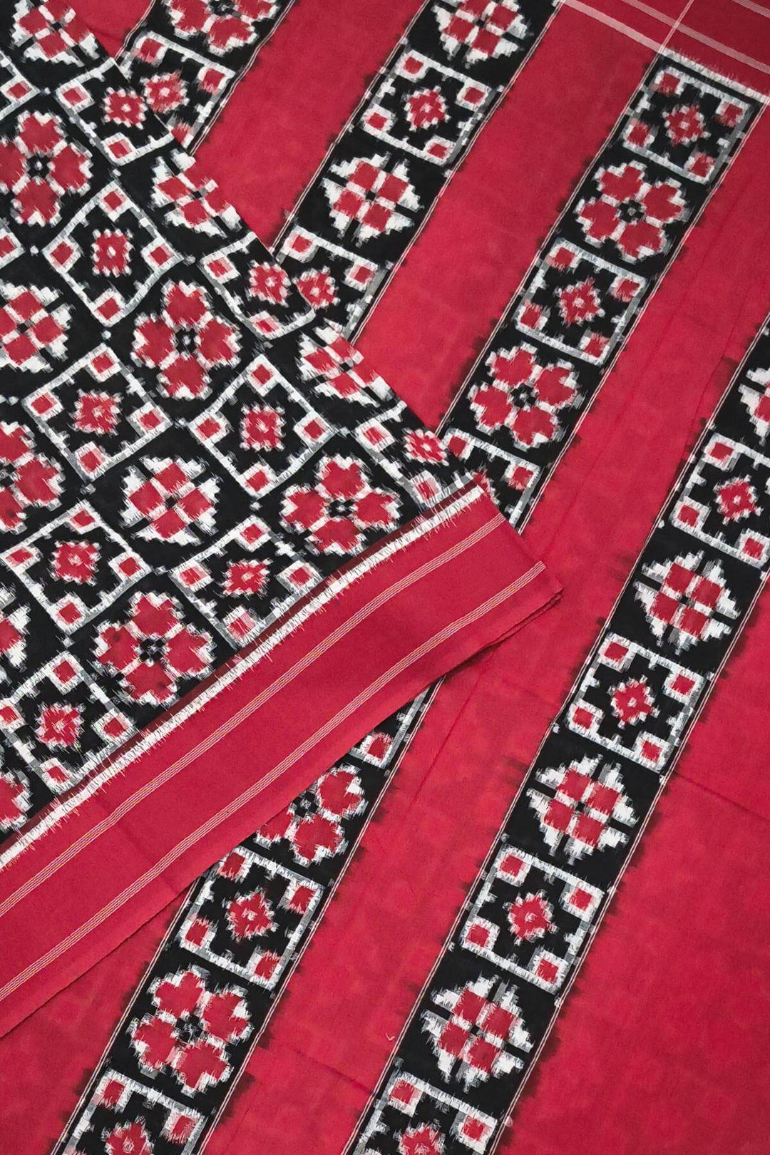 handwoven double ikkat telia  pure cotton saree in black