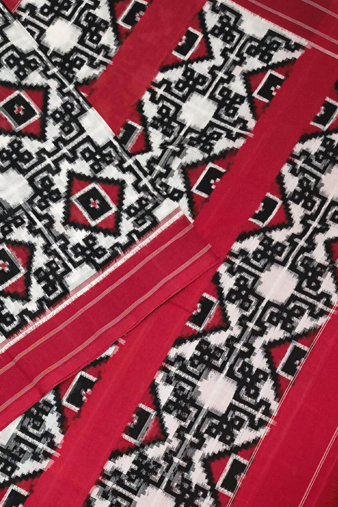 Handwoven double ikkat telia  pure cotton saree in  off white