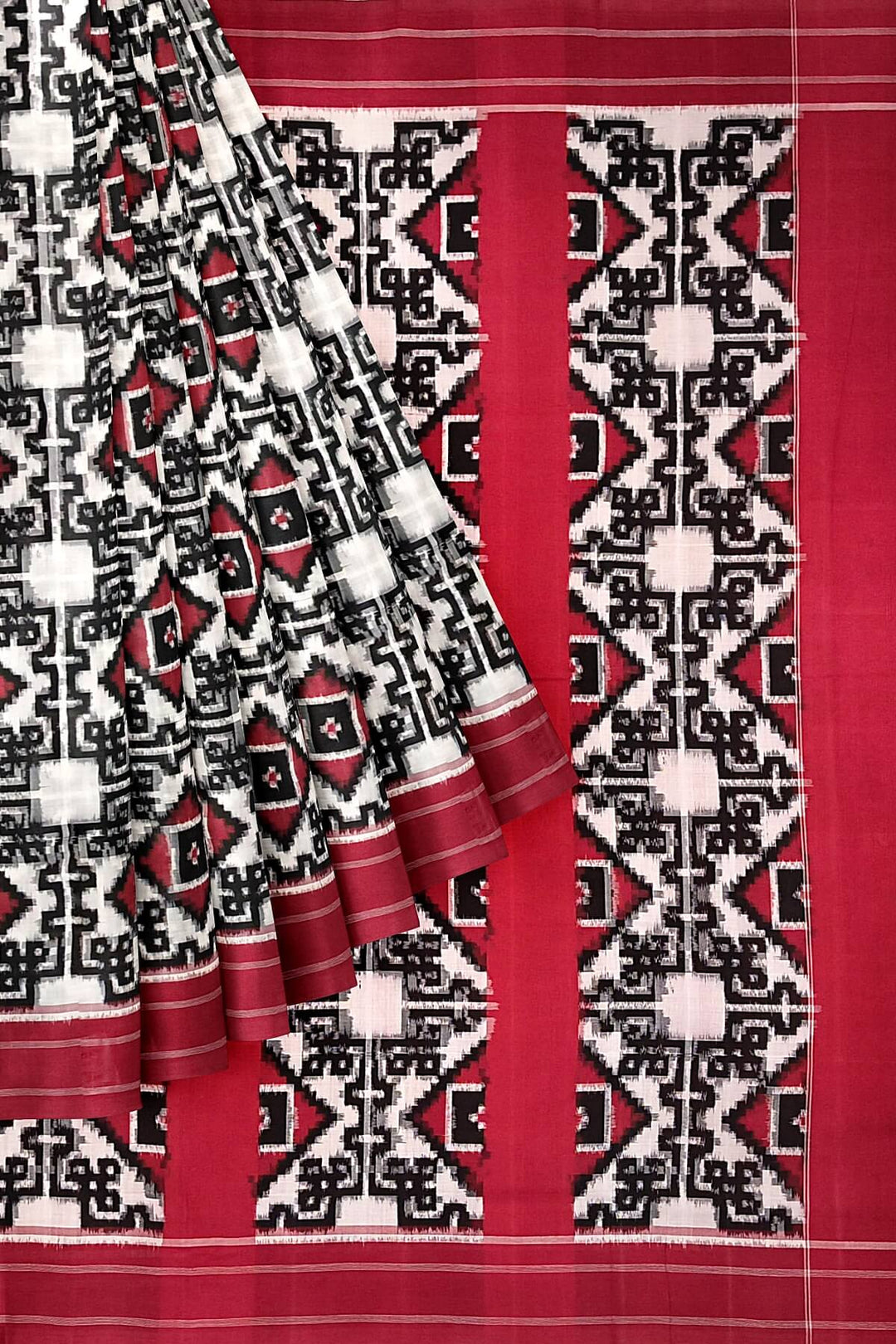 Handwoven double ikkat telia  pure cotton saree in  off white