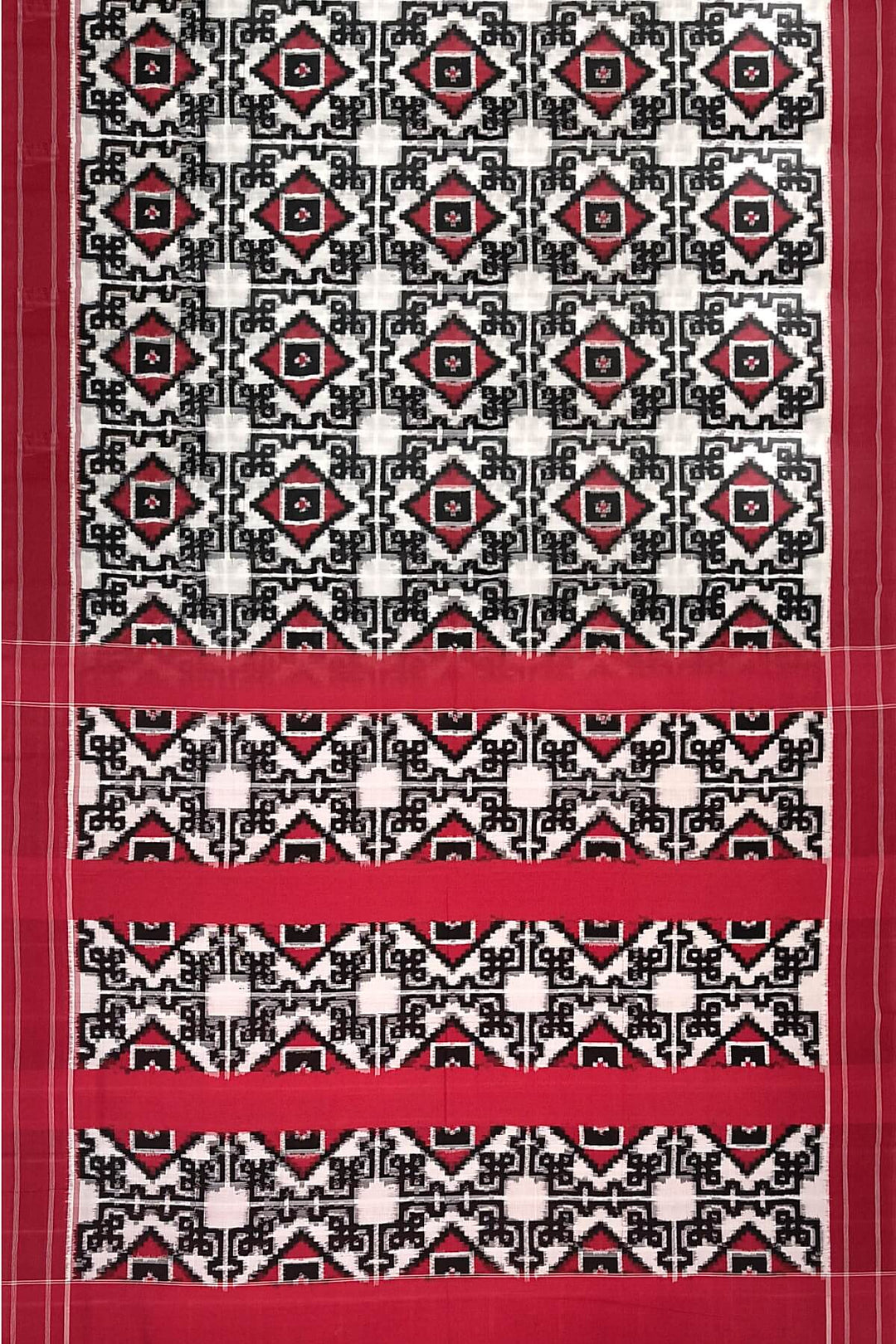 Handwoven double ikkat telia  pure cotton saree in  off white