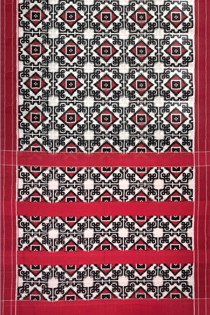 Handwoven double ikkat telia  pure cotton saree in  off white