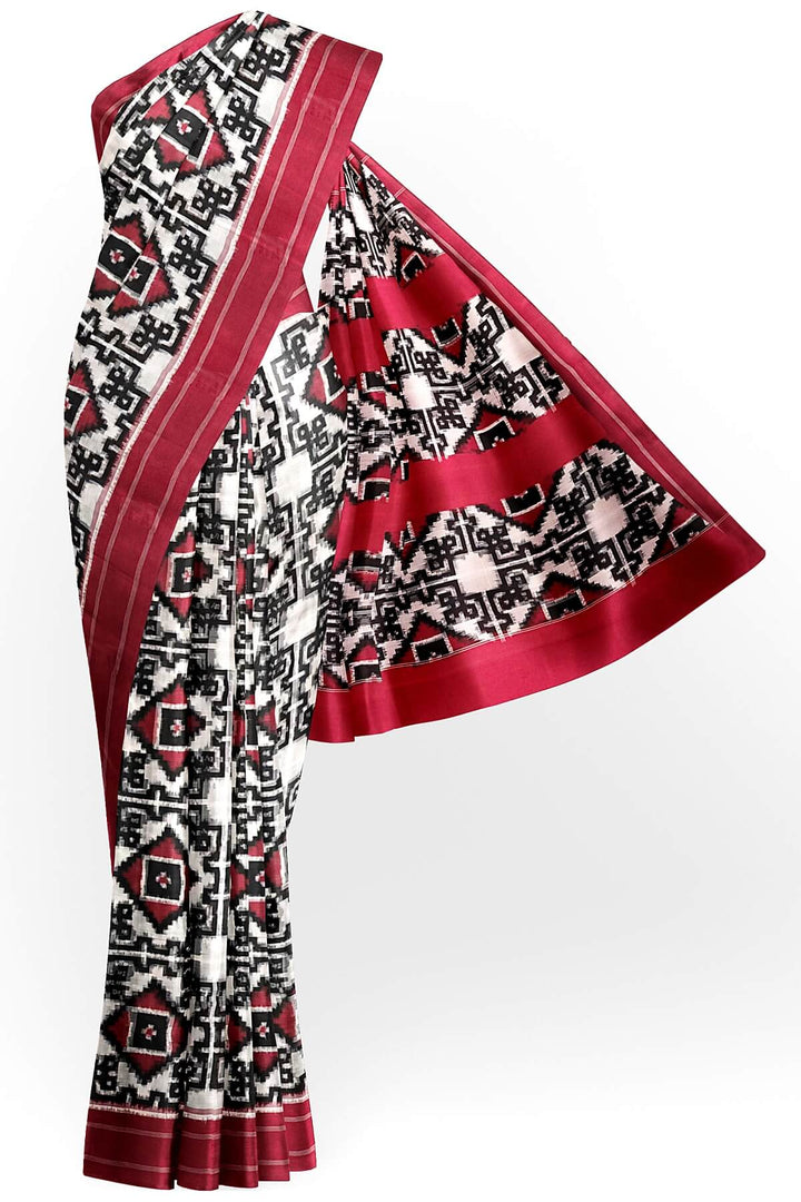 Handwoven double ikkat telia  pure cotton saree in  off white