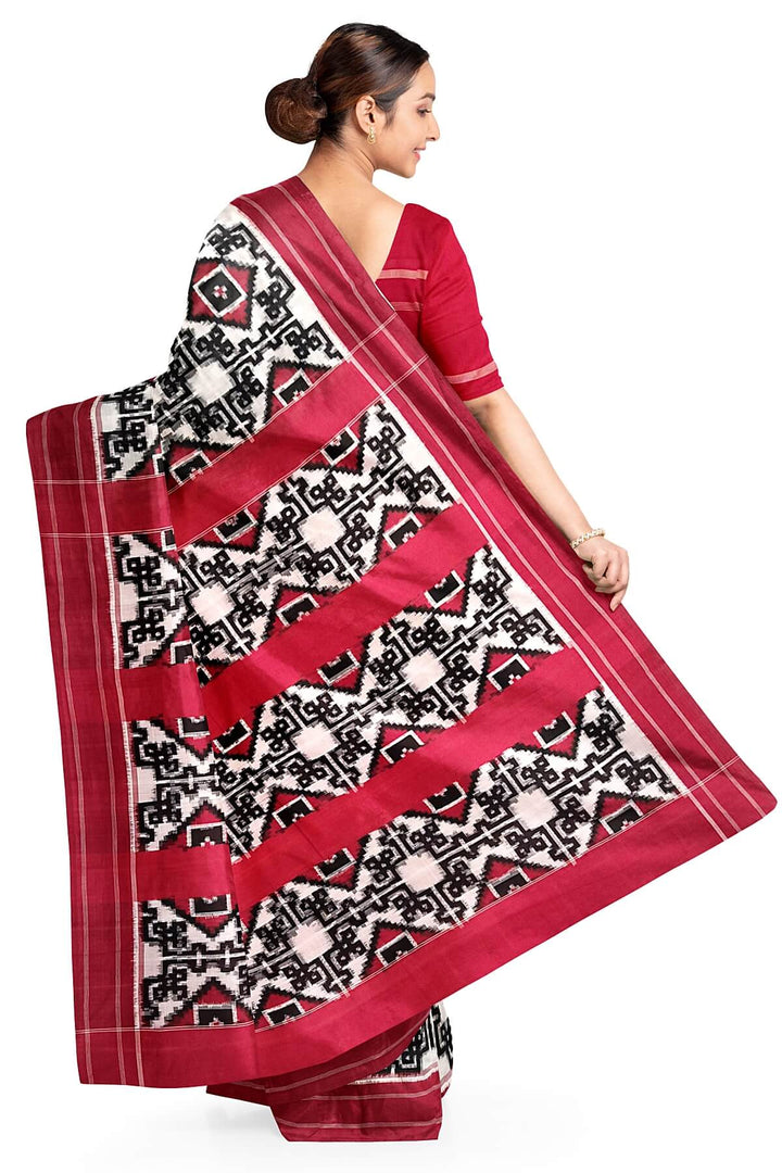 Handwoven double ikkat telia  pure cotton saree in  off white