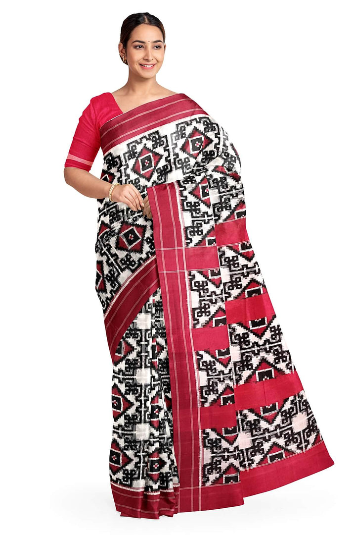 Handwoven double ikkat telia  pure cotton saree in  off white