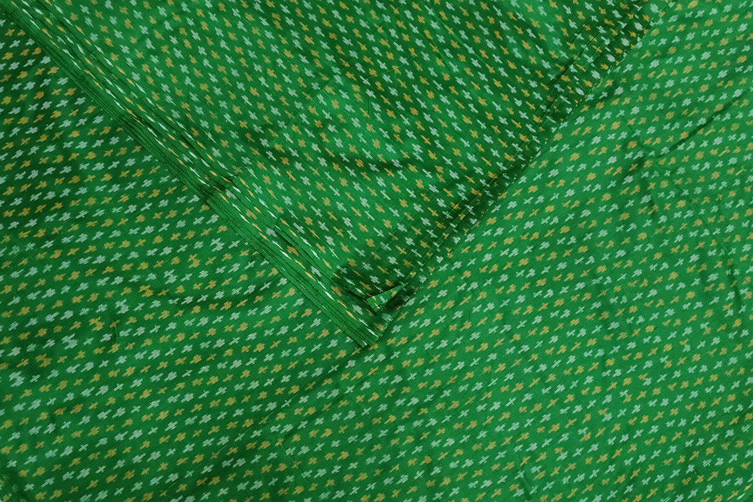 Handwoven Ikat pure silk fabric in green with small motifs