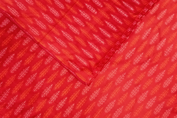 Handwoven Ikat pure silk fabric in reddish orange