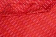 Handwoven Ikat pure silk fabric in reddish orange