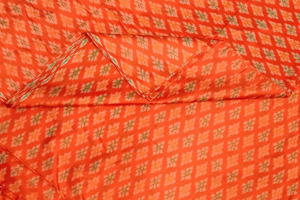 Handwoven Ikat pure silk fabric in orange