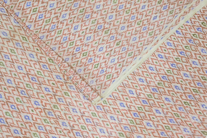 Handwoven Ikat pure silk fabric in diamond pattern in off white