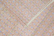 Handwoven Ikat pure silk fabric in diamond pattern in off white