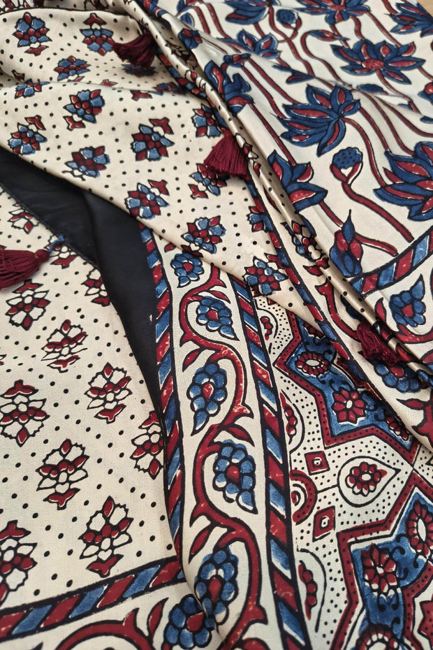 Modal silk saree in off white with lotus motifs in hand block ajrakh print