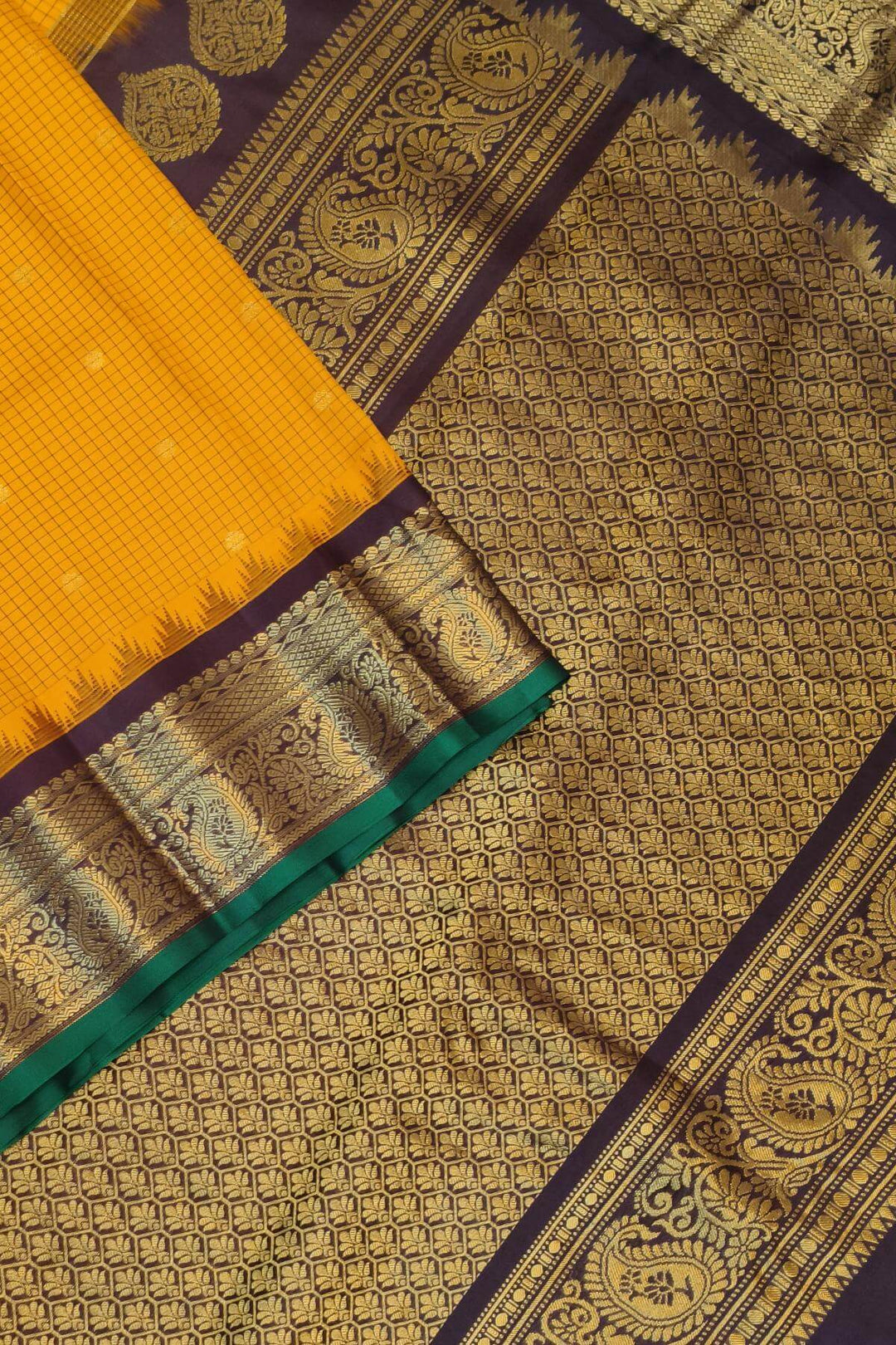 Gadwal pure silk saree in mustard & brown with checks & buttis.