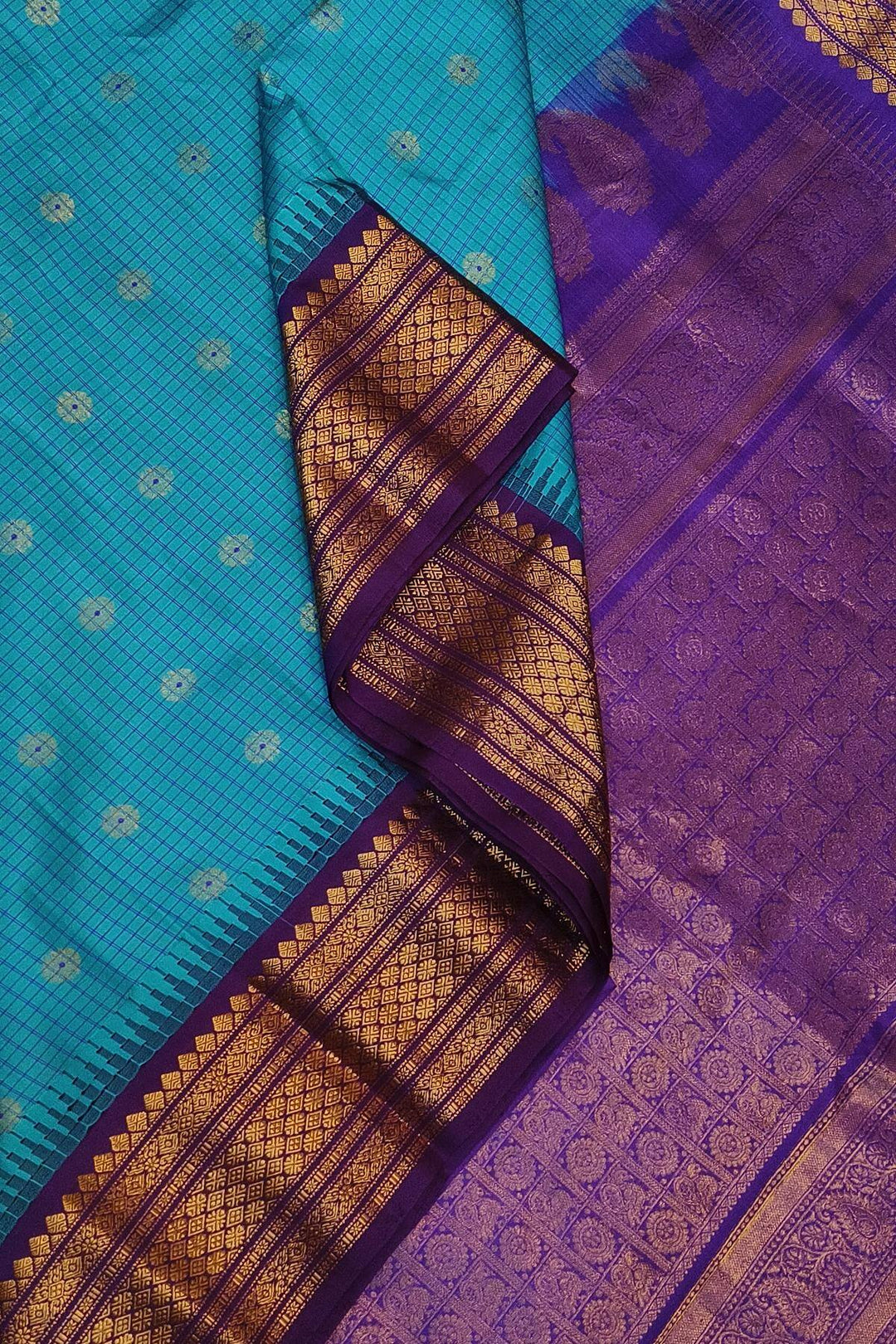 Gadwal pure silk saree in ananda blue & purple with checks & buttis.