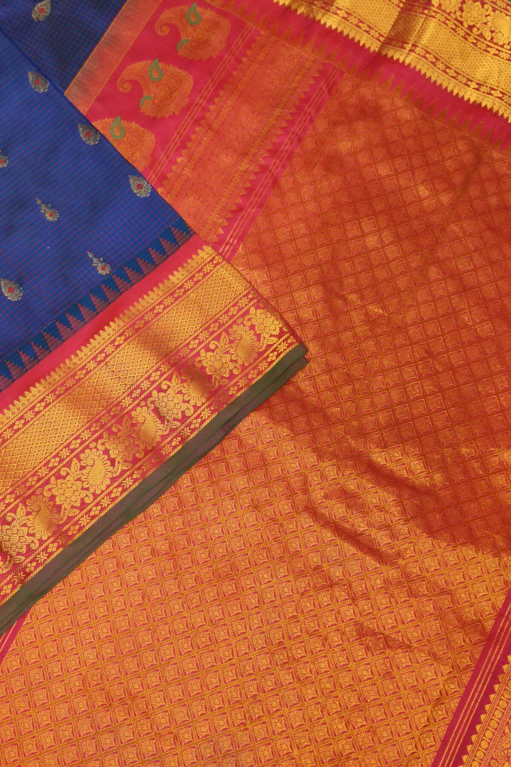 Gadwal pure silk saree in navy blue & magenta with checks & buttis.