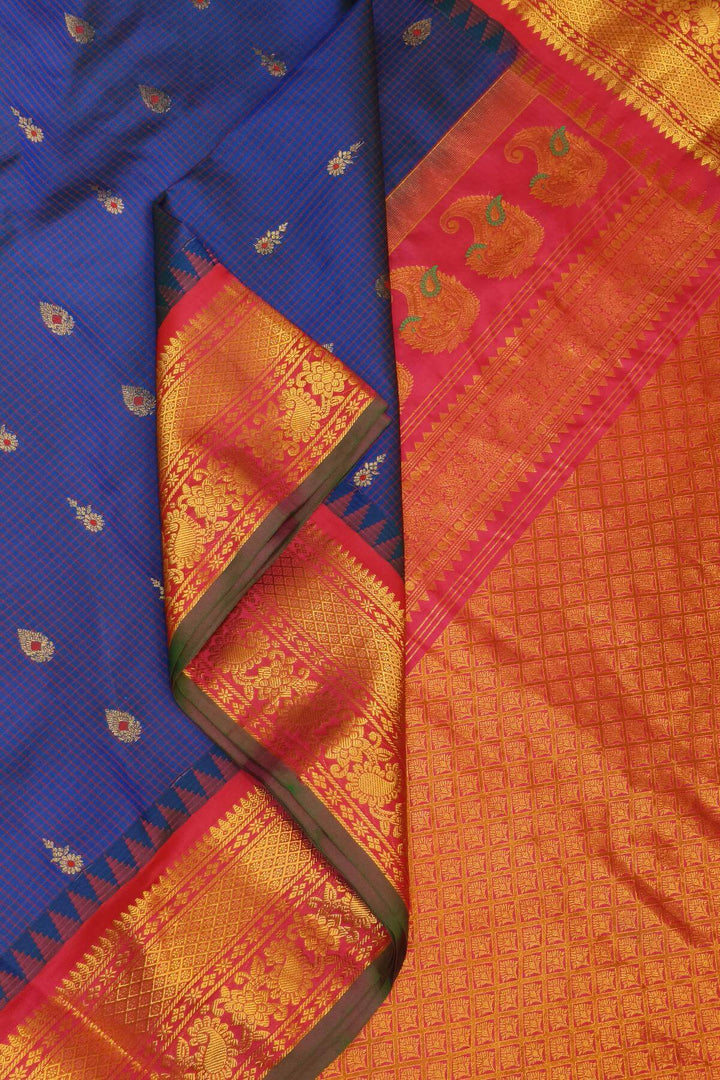 Gadwal pure silk saree in navy blue & magenta with checks & buttis.
