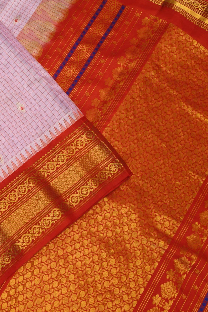 Gadwal pure silk saree in baby pink & red with checks & buttis.