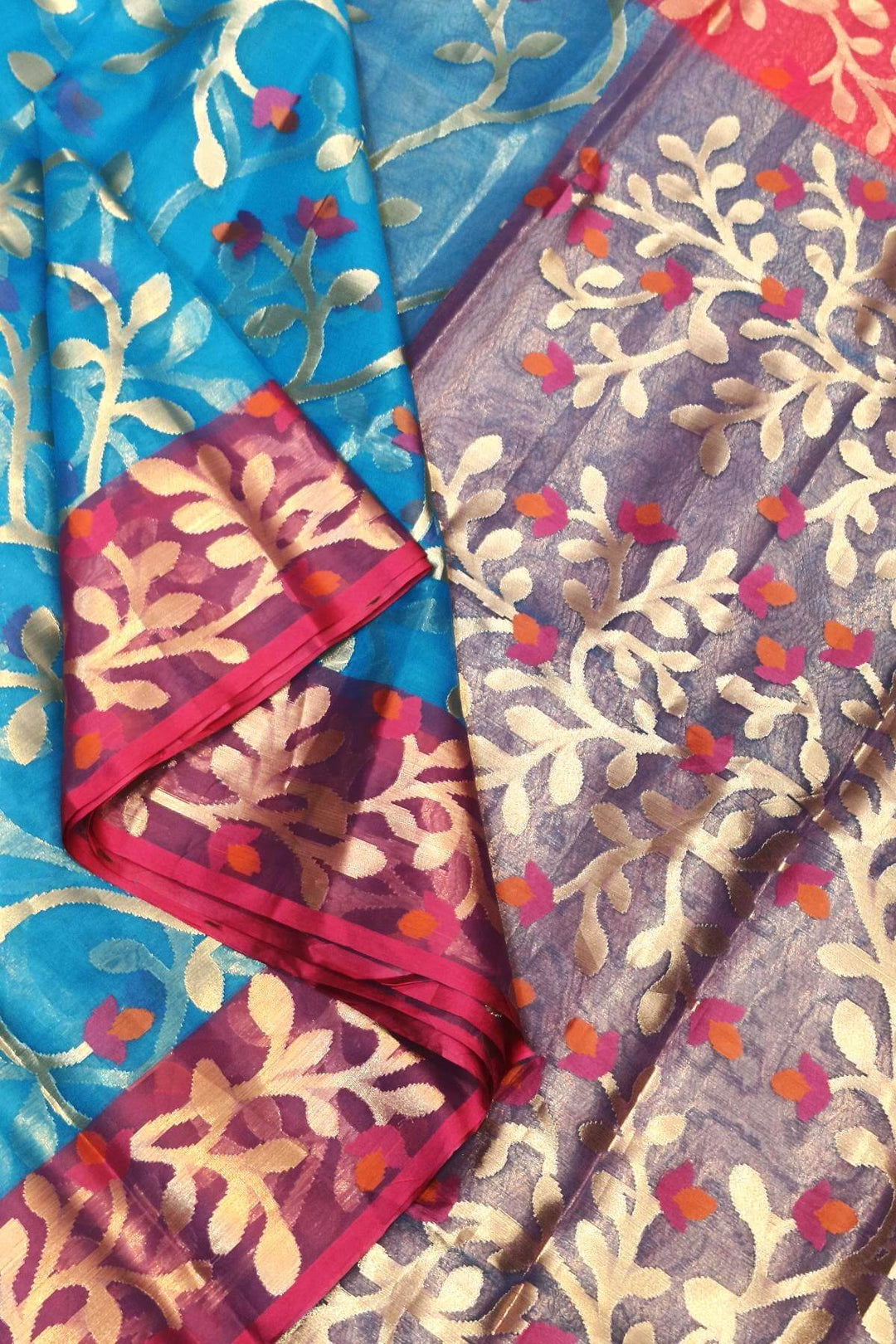 Muslin organza saree in sky blue  & pink  in jamdani weave