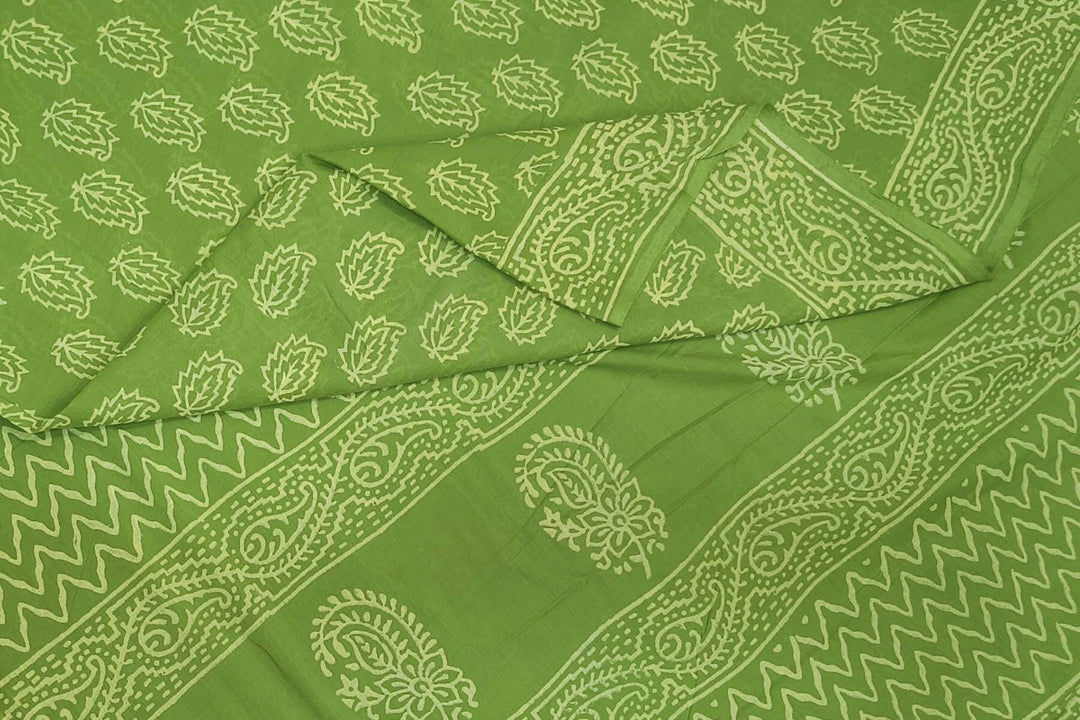 Jaipur mul cotton saree in green  with paisley motifs.