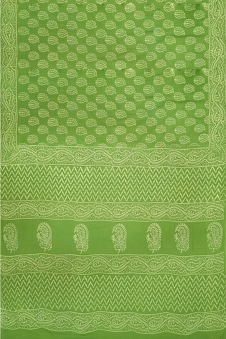 Jaipur mul cotton saree in green  with paisley motifs.