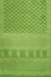 Jaipur mul cotton saree in green  with paisley motifs.