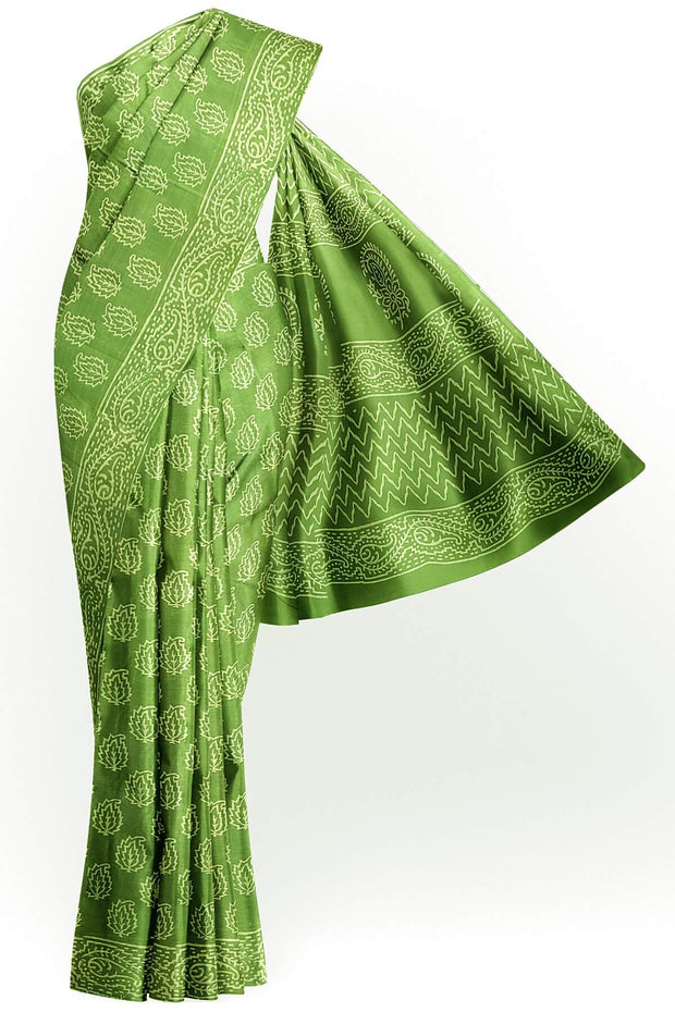 Jaipur mul cotton saree in green  with paisley motifs.