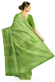 Jaipur mul cotton saree in green  with paisley motifs.