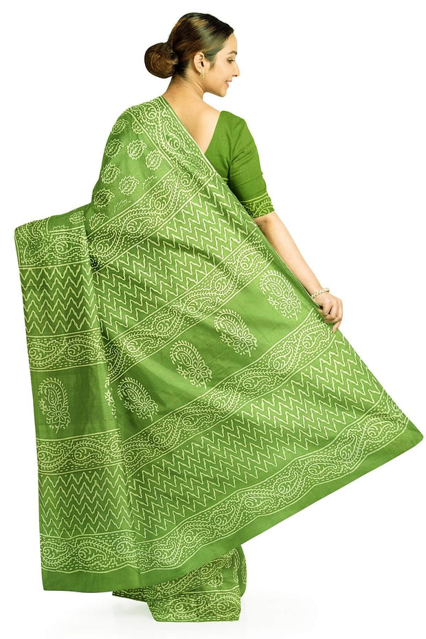Jaipur mul cotton saree in green  with paisley motifs.