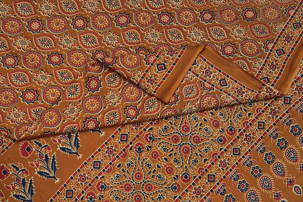 Jaipur mul cotton saree in mustard  in ajrakh pattern.