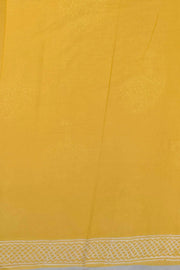 Jaipur mul cotton saree in light yellow  with plant motifs.