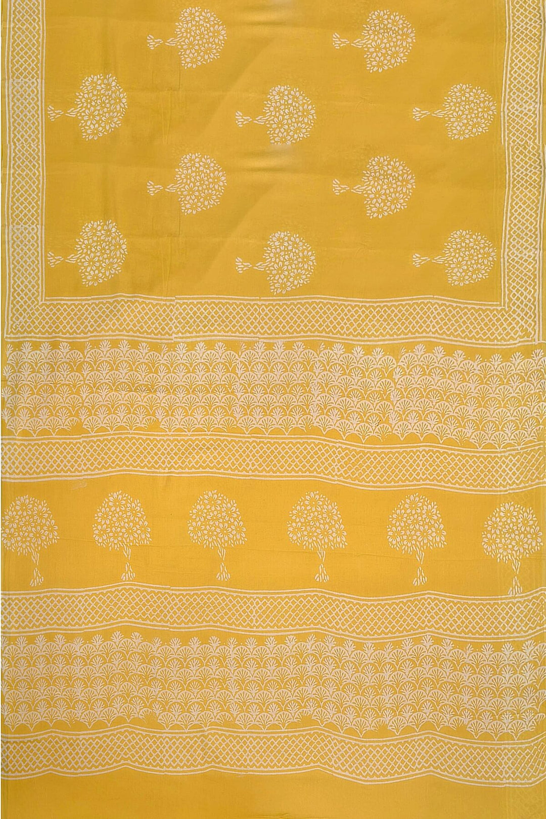 Jaipur mul cotton saree in light yellow  with plant motifs.