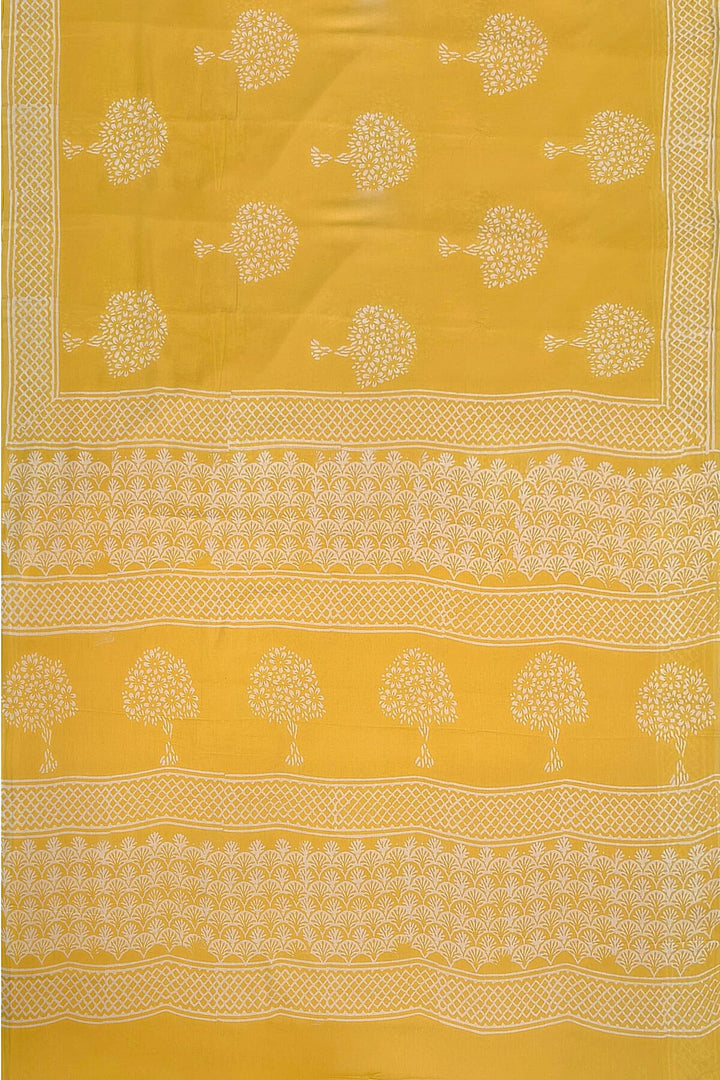 Jaipur mul cotton saree in light yellow  with plant motifs.