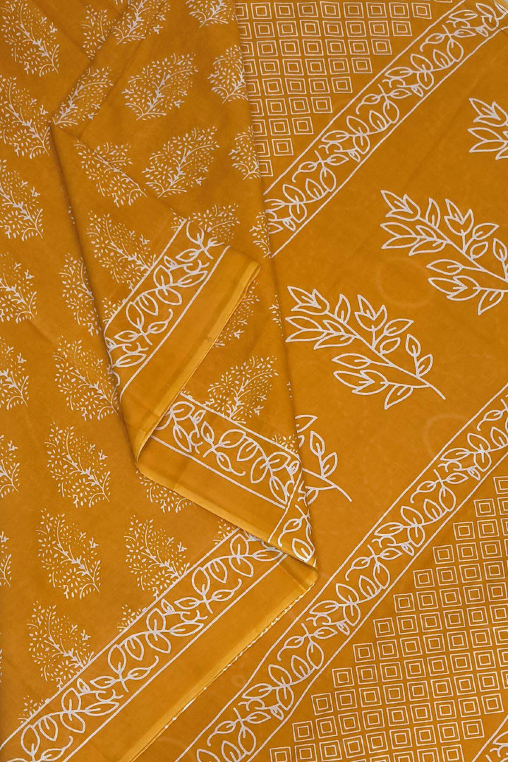 Jaipur mul cotton saree in orange with floral motifs