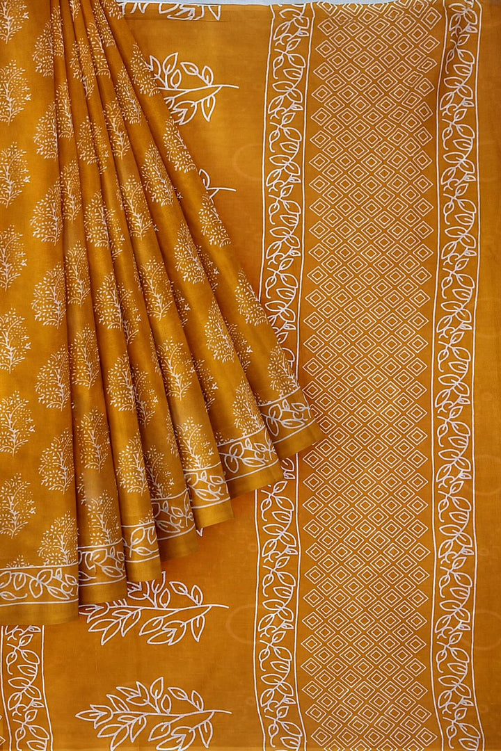 Jaipur mul cotton saree in orange with floral motifs