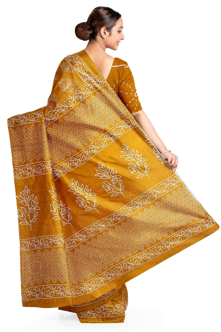 Jaipur mul cotton saree in orange with floral motifs