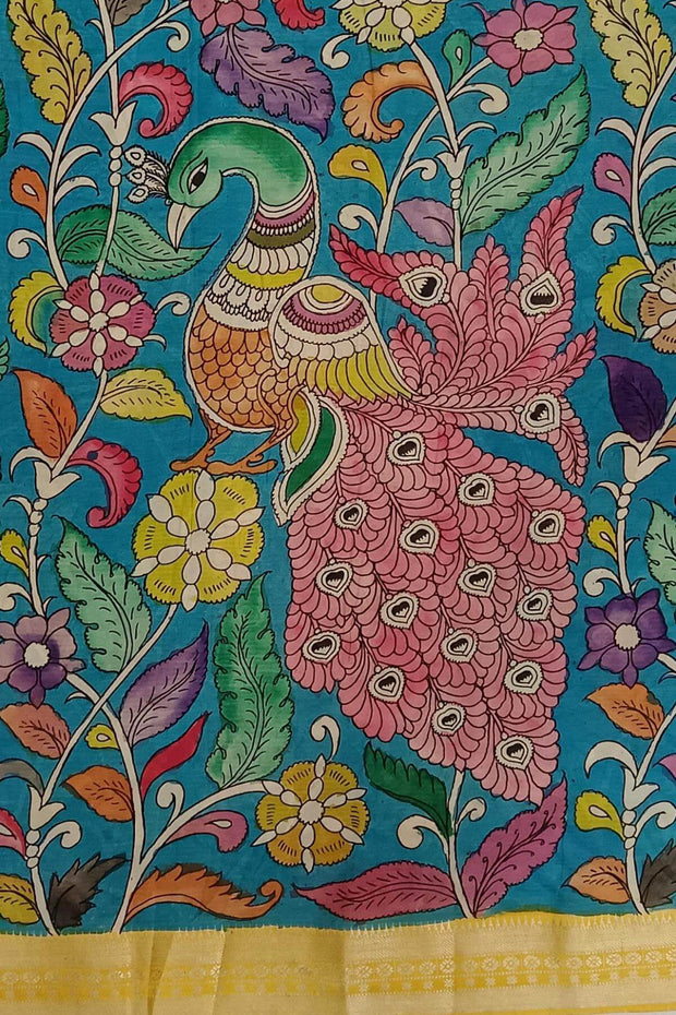 Hand painted Kalamkari on Bangalore silk saree in blue with coloured peacocks.