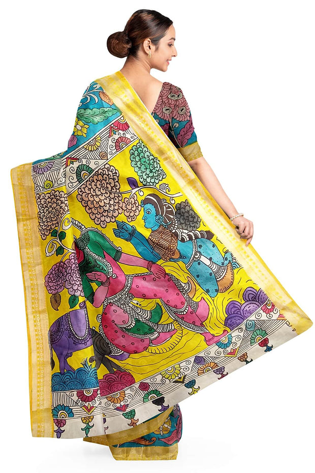 Hand painted Kalamkari on Bangalore silk saree in blue with coloured peacocks.
