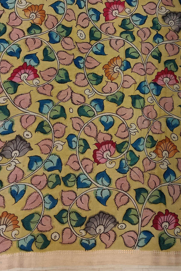 Hand painted Kalamkari on Bangalore silk saree in pink with a village theme.