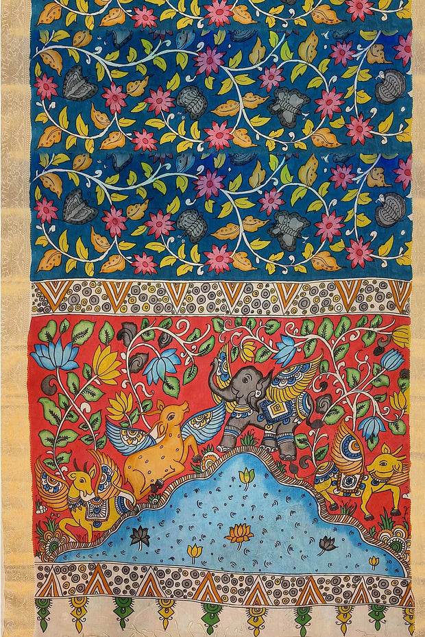 Hand painted Kalamari on Bangalore silk saree in  peacock blue with floral vines & peacocks.