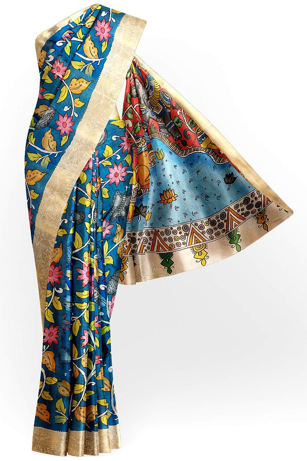 Hand painted Kalamari on Bangalore silk saree in  peacock blue with floral vines & peacocks.