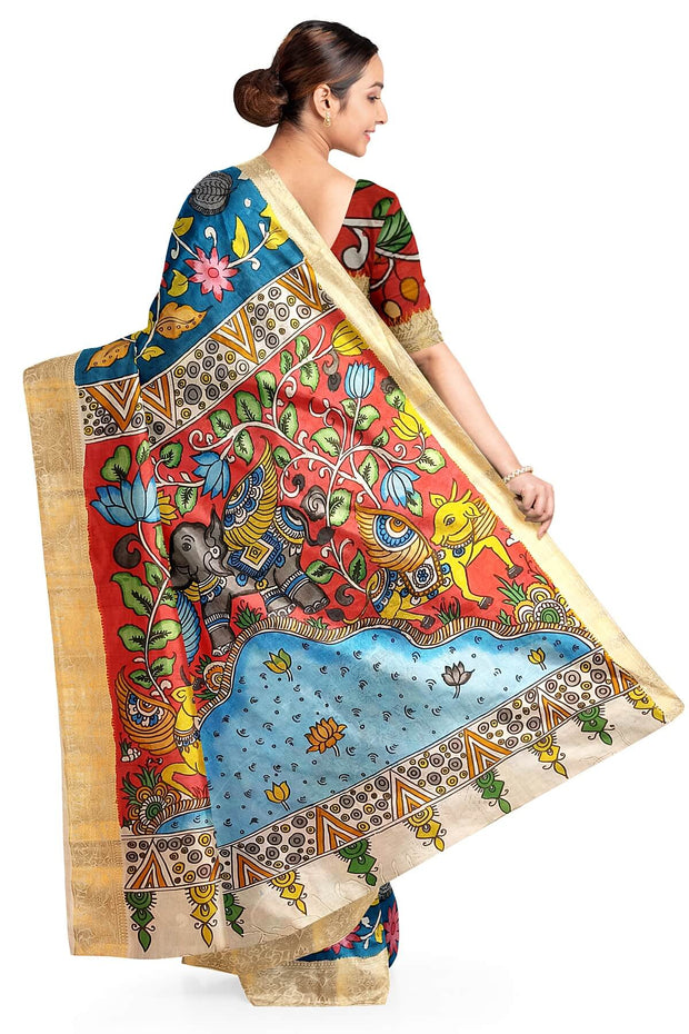Hand painted Kalamari on Bangalore silk saree in  peacock blue with floral vines & peacocks.
