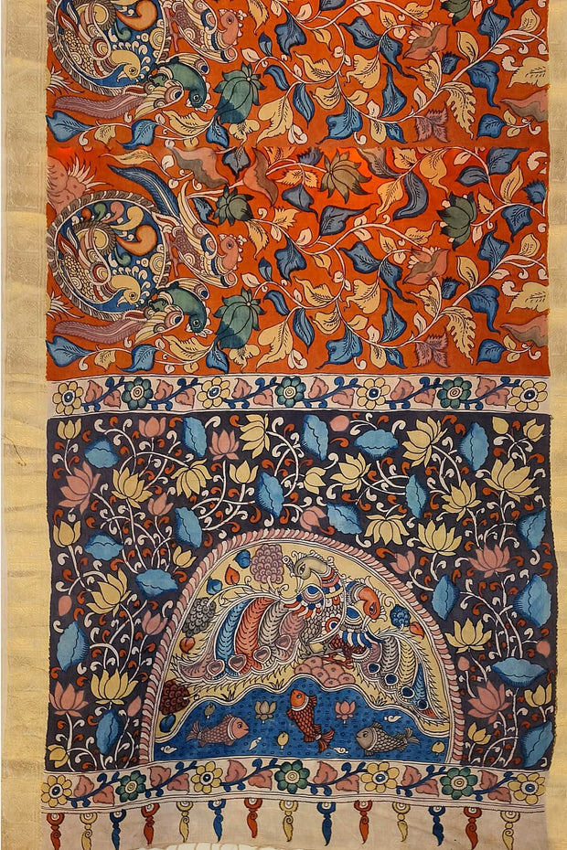 Hand painted Kalamari on Bangalore silk saree in brick red with floral vines .
