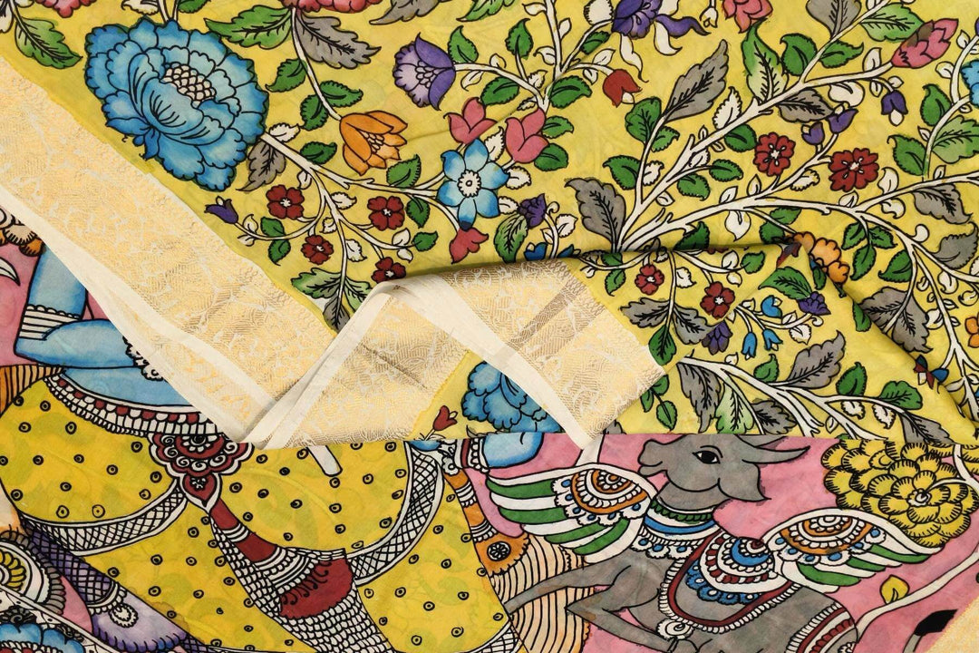 Hand painted Kalamkari on Bangalore silk saree in light yellow