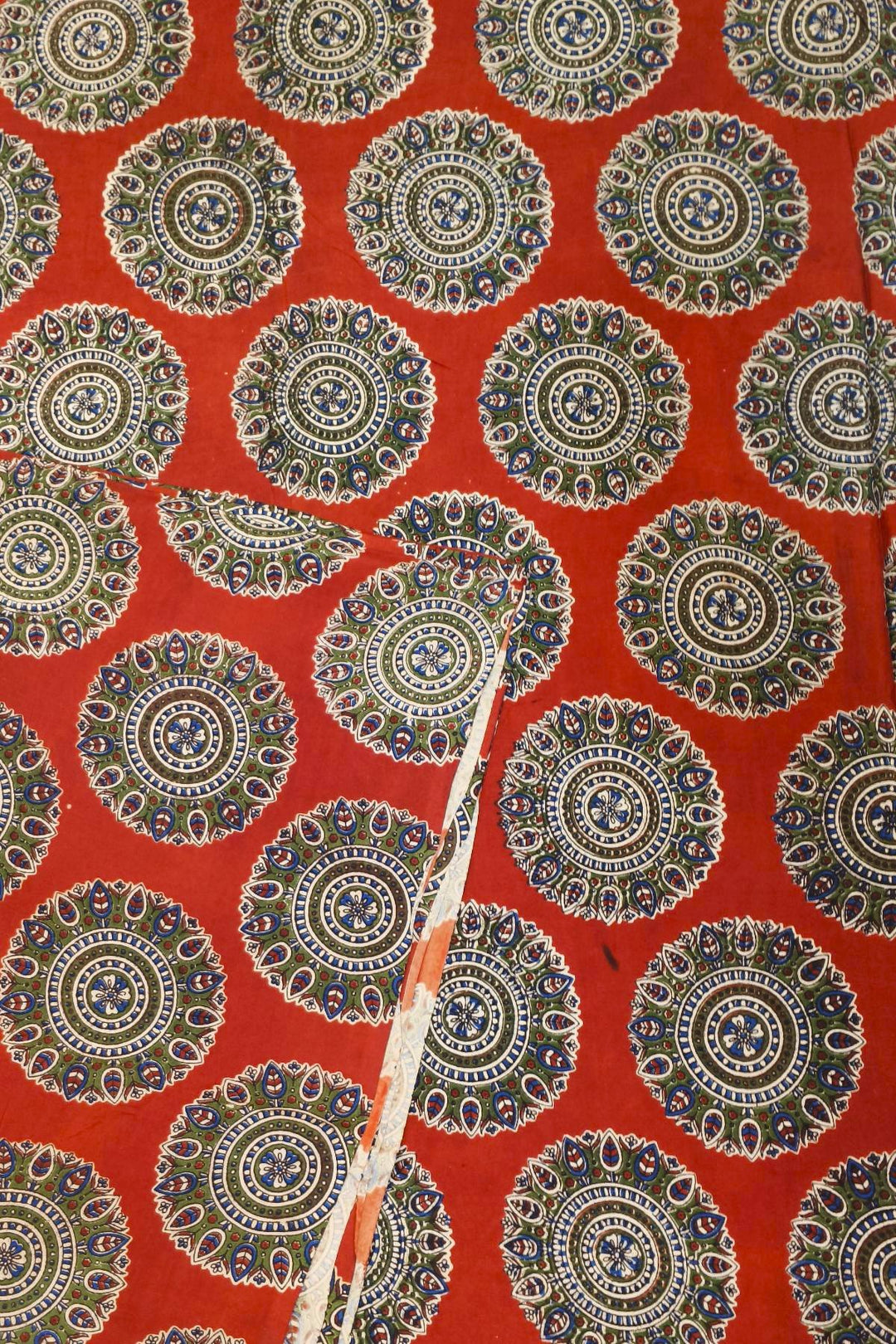 Kalamkari  silk cotton fabric in maroon with  disc motifs