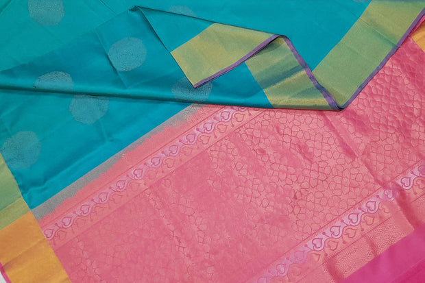 Kanchi soft silk  saree in teal blue with big motifs and geometric pattern in pallu.