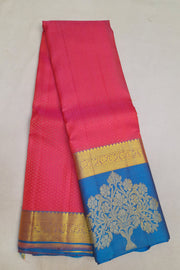 Kanchi silk brocade saree in pink with floral motifs in border and a rich pallu