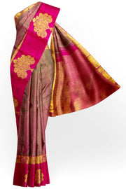 Kanchi silk brocade saree in olive green with floral motifs in border and a rich pallu