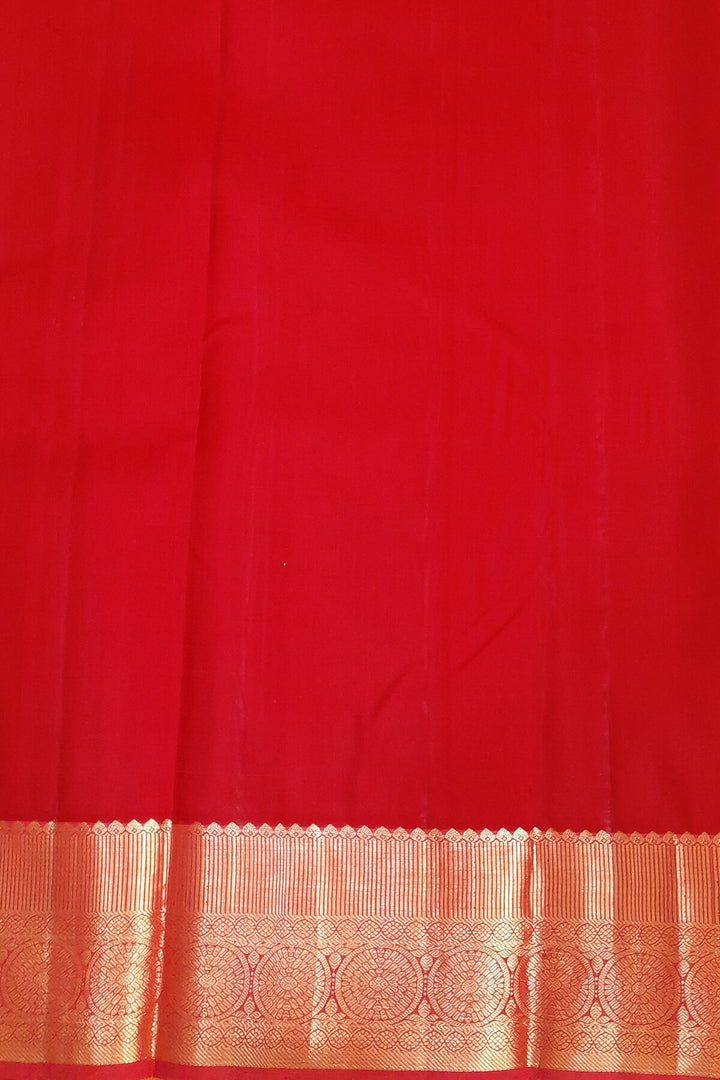 Kanchi pure silk saree in yellow with floral motifs on the body,