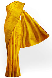 Kanchi pure silk saree in yellow with floral motifs on the body,